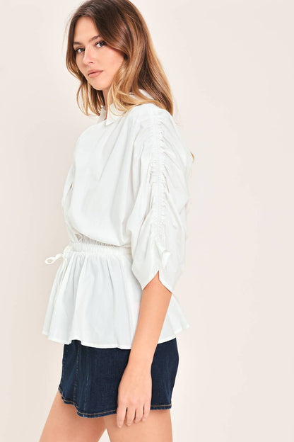 Elegant white peplum top
