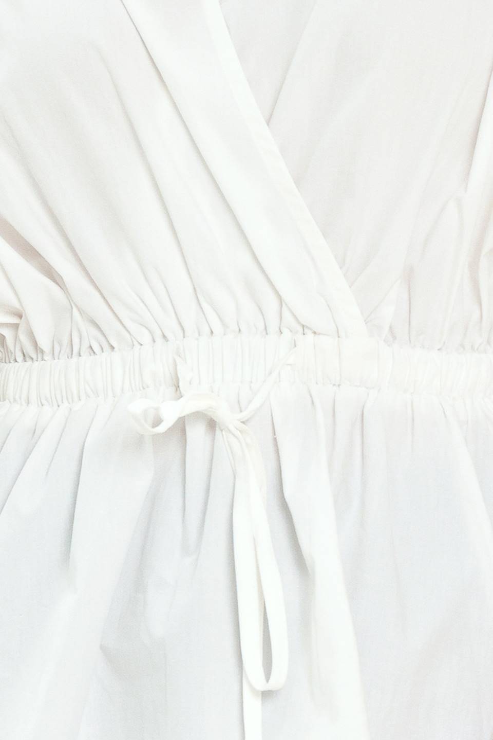 Elegant white peplum top